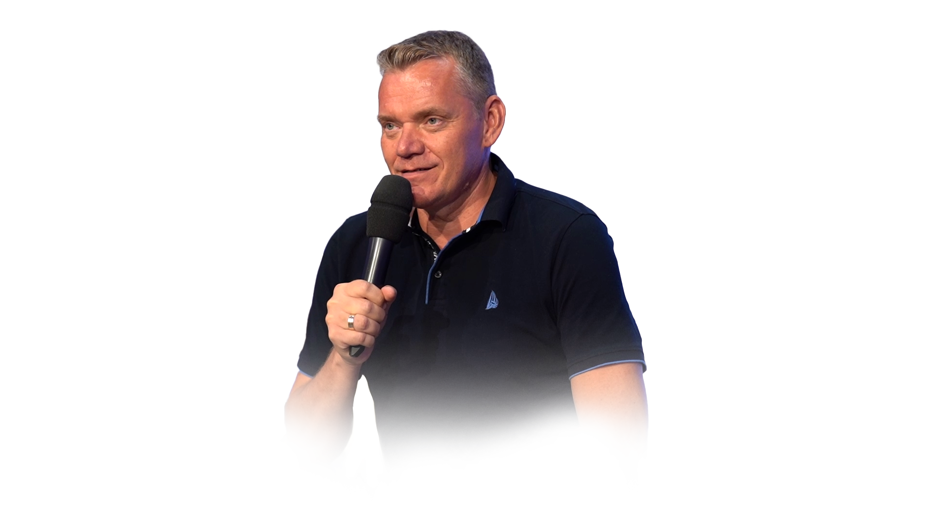 Tóth Géza pásztor mikrofonnal
